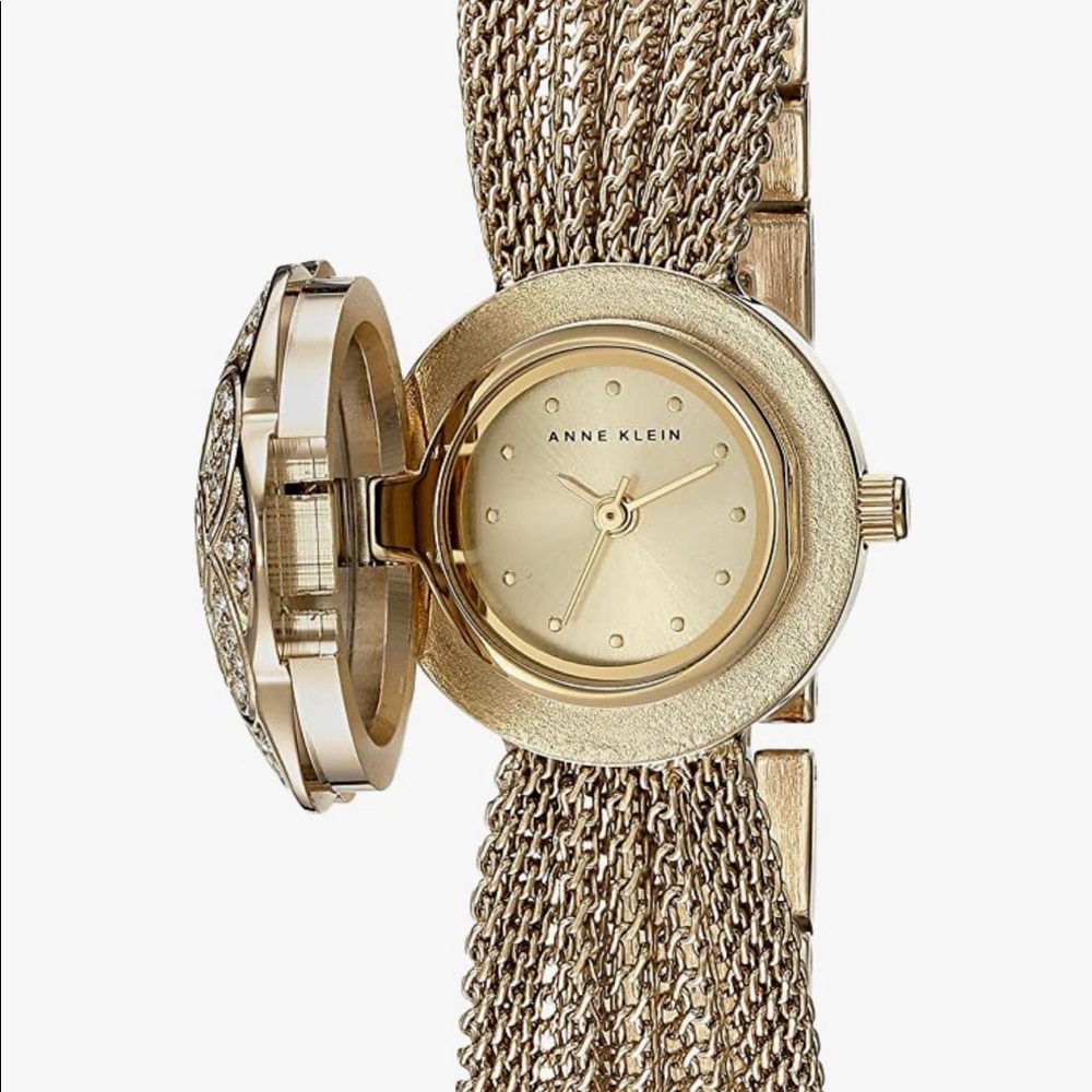 Anne Klein Women’s Premium Crystal Accented Watch (AK/1046CHCV)